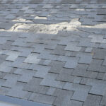 Damaged shingle roof