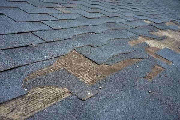 A damaged roof, missing shingles